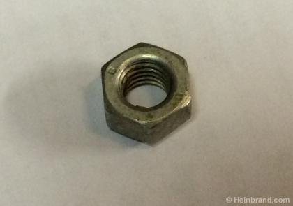 Nut for camshaft screw